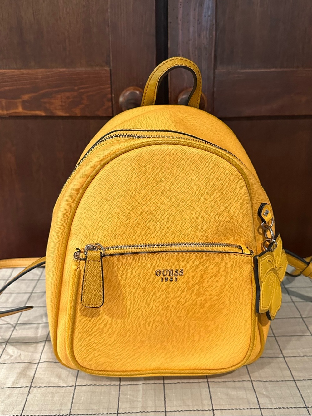 GUESS 1981 • yellow leather small backpack purse